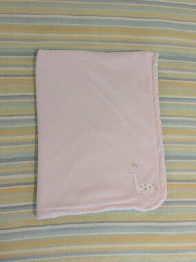 Carter's light pink Giraffe baby blanket